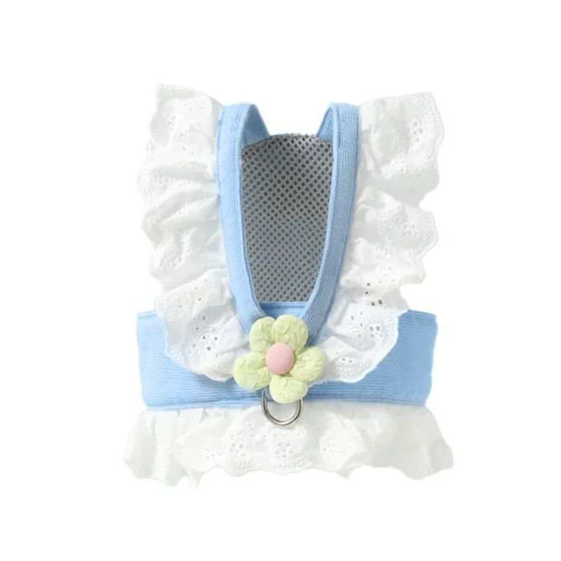 Pet harness with white lace, blue straps, and a floral design on a white background