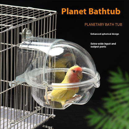 Clear 'Planet Bathtub' product for birds inside a cage with a parrot visible.