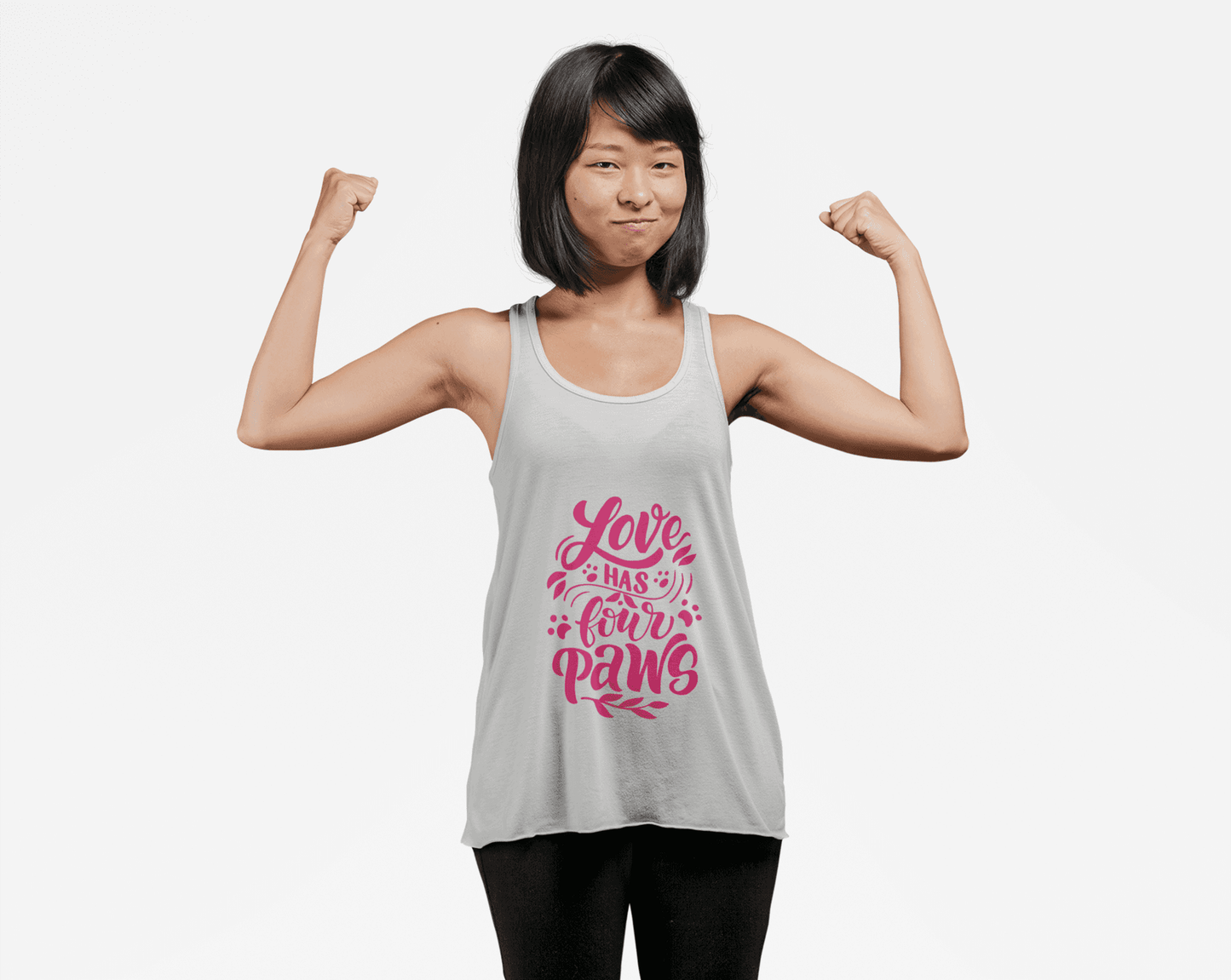 Woman wearing a white tank top with pink Love Has Four Paws text design by Printify