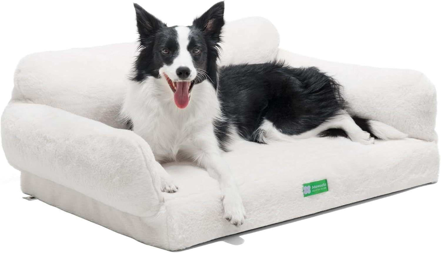 Black and white Border Collie relaxing on a white Orthopedic Egg Foam Sofa pet bed